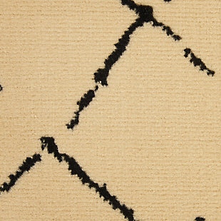 Playful and primitive, this grafix area rug from nourison features distressed black tribal rug patterns on a luxurious cream field. Each rug is power-loomed for simple care, superior wear, and a splendid look and feel, and will transform even the most ordinary room into something extraordinary.Serged edges | Easy-care fibers | Cut pile | Machine made | Power-loomed | Low shedding | Recommended for areas with moderate foot traffic | Indoor only | 100% polypropylene | Imported