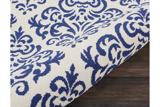Damask design takes elegance to another level with glamorous, geometric precision of ornate navy patterns on a white field. Power loomed for long wear and low maintenance, this grafix runner rug from nourison will lend a dash of drama to any room.Serged edges | Easy-care fibers | Cut pile | Machine made | Power-loomed | Low shedding | Recommended for areas with moderate foot traffic | Indoor only | 100% polypropylene | Imported