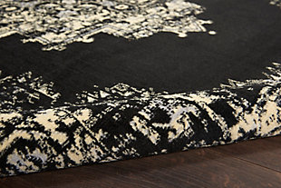In intriguing shades of black and cream this brilliantly-bordered, central medallion Grafix area rug from Nourison will elevate the elegance quotient of any room. Masterfully power loomed for a lavish feel, long wear and low maintenance.Serged Edges | Easy-care fibers | Cut pile | Machine made | Power-loomed | Low shedding | Recommended for areas with moderate foot traffic | Indoor only | 100% Polypropylene | Imported