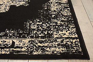 In intriguing shades of black and cream this brilliantly-bordered, central medallion Grafix area rug from Nourison will elevate the elegance quotient of any room. Mastery power loomed for a lavish feel, long wear and low maintenance.Serged Edges | Easy-care fibers | Cut pile | Machine made | Power-loomed | Low shedding | Recommended for areas with moderate foot traffic | Indoor only | 100% Polypropylene | Imported