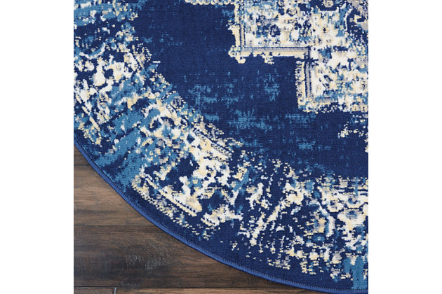 In intriguingly distressed shades of blue and white, this Grafix area rug from Nourison will elevate the elegance quotient of any room. Each rug is brilliantly bordered in traditional Persian rug style, and masterfully power loomed for a lavish feel, long wear, and low maintenance.Serged Edges | Easy-care fibers | Cut pile | Machine made | Power-loomed | Low shedding | Recommended for areas with moderate foot traffic | Indoor only | 100% Polypropylene | Imported