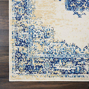 In intriguingly distressed shades of navy blue and white, this Grafix area rug from Nourison will elevate the elegance quotient of any room. Each rug is brilliantly bordered in traditional Persian rug style, and masterfully power loomed for a lavish feel, long wear, and low maintenance.Serged Edges | Easy-care fibers | Cut pile | Machine made | Power-loomed | Low shedding | Recommended for areas with moderate foot traffic | Indoor only | 100% Polypropylene | Imported | Backing: latex | Rug pad recommended | Vacuum regularly, clean spills immediately by blotting with a clean sponge or cloth. Professional cleaning recommended.