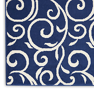 Curling vines form a lush abstract garden in this grafix collection runner rug. This botanical style rug features ivory patterns on a rich navy blue field, with voluptuous curves creating a statement of soft comfort with artistic flair.Serged edges | Easy-care fibers | Cut pile | Machine made | Power-loomed | Low shedding | Recommended for areas with moderate foot traffic | Indoor only | 100% polypropylene | Imported