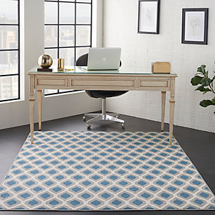The hexagon-themed repeat pattern of this grafix area rug creates a dimensional op-art look that draws the eye and pulls a room together. The combination of muted blue, beige and ivory creates a subtle yet stunning focal point for the contemporary home.Serged edges | Easy-care fibers | Cut pile | Machine made | Power-loomed | Low shedding | Recommended for areas with moderate foot traffic | Indoor only | 100% polypropylene | Imported