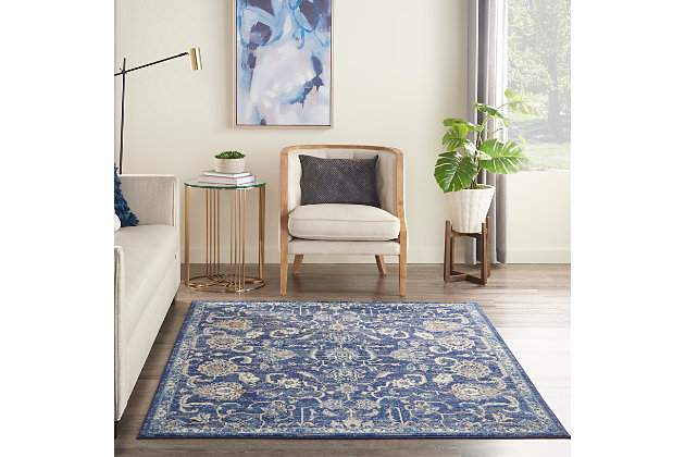 With finely detailed palmettes on an abrash blue field, this grafix collection rug by nourison brings the elegance of persian rug design to your home with a traditional all-over design in beige and gold. Easy-care fibers provide excellent durability and inviting texture for a touch of old world flavor that's at home in any décor.Serged edges | Easy-care fibers | Cut pile | Machine made | Power-loomed | Low shedding | Recommended for areas with moderate foot traffic | Indoor only | 100% polypropylene | Imported