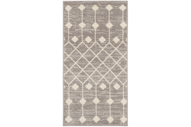 The moroccan diamond bead pattern of this grafix area rug creates a dimensional op-art look that draws the eye and pulls a room together. The soft combination of grey and ivory creates a subtle yet stunning focal point for the contemporary home.Serged edges | Easy-care fibers | Cut pile | Machine made | Power-loomed | Low shedding | Recommended for areas with moderate foot traffic | Indoor only | 100% polypropylene | Imported