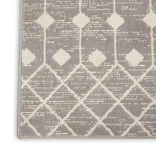 The moroccan diamond bead pattern of this grafix area rug creates a dimensional op-art look that draws the eye and pulls a room together. The soft combination of grey and ivory creates a subtle yet stunning focal point for the contemporary home.Serged edges | Easy-care fibers | Cut pile | Machine made | Power-loomed | Low shedding | Recommended for areas with moderate foot traffic | Indoor only | 100% polypropylene | Imported