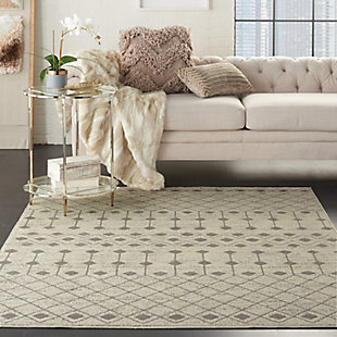 The moroccan diamond bead pattern of this grafix area rug creates a dimensional op-art look that draws the eye and pulls a room together. The soft combination of ivory and grey creates a subtle yet stunning focal point for the contemporary home.Serged edges | Easy-care fibers | Cut pile | Machine made | Power-loomed | Low shedding | Recommended for areas with moderate foot traffic | Indoor only | 100% polypropylene | Imported