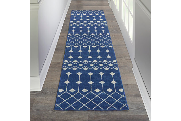 The moroccan diamond bead pattern of this grafix area rug creates a dimensional op-art look that draws the eye and pulls a room together. The soft combination of ivory and grey creates a subtle yet stunning focal point for the contemporary home.Serged edges | Easy-care fibers | Cut pile | Machine made | Power-loomed | Low shedding | Recommended for areas with moderate foot traffic | Indoor only | 100% polypropylene | Imported