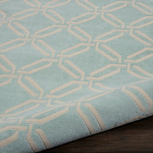 This bold and eclectic round rug from the jubilant collection features a contemporary interlocking trellis design, making a statement of classic chic in ivory on aqua. Sleek, low-pile construction from easy-care fibers lets you bring extra energy and excitement anywhere in the home.Easy-care fibers | Low pile construction | Cut pile | Machine made | Power-loomed | Low shedding | Recommended for areas with moderate foot traffic | Indoor only | 100% polypropylene | Imported