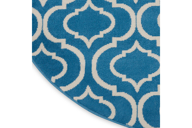 Introduce a touch of moroccan flair with this intriguing jubilant collection round rug, featuring a lantern trellis pattern. Exotic yet versatile in ivory on blue, with easy-care fibers in a sleek, low-pile construction that brings life and energy to any room in the home.Easy-care fibers | Low pile construction | Cut pile | Machine made | Power-loomed | Low shedding | Recommended for areas with moderate foot traffic | Indoor only | 100% polypropylene | Imported