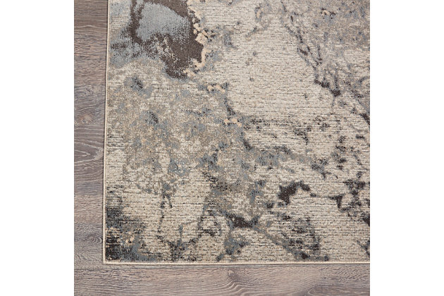 Stri abstract patterned rug leaves so much to the imagination. Its ethereal design dresses up a room with glamourously gradated shades, visual texture and a highly contemporary point of view.Made of polyester | Machine woven | Cut pile, low shedding | Latex bac | Imported | Spot clean