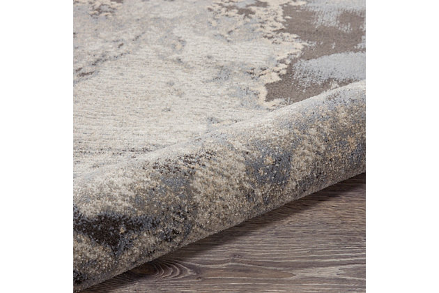 This maxell collection rug infuses any space with dramatic energy and sense of motion, with its bold, fluid abstract patterns. Richly pigmented neutral tones in a spectrum of greys, natural cream, and beige swirl across its beautifully textured expanse. Enhance your collection or create a focal point with this special piece.Serged edges | Easy-care fibers | Cut pile | Machine made | Power-loomed | Low shedding | Recommended for areas with moderate foot traffic | Indoor only | 100% polyester | Imported