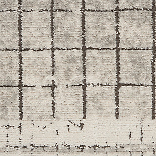 A subtle grid creates a linear motif in this modern abstract area rug from the quarry collection. Its contemporary allure is finished with a side borders, an intriguingly distressed surface and a thick, luscious pile with cut texture. Power-loomed in soft ivory, quartz grey, and taupe detailing with serged edge for modern simplicity.Easy-care fibers | Serged edges | Cut pile | Machine made | Power-loomed | Moderate shedding | Recommended for areas with moderate foot traffic | Indoor only | 80% polypropylene, 20% polyester | Imported