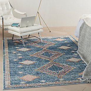 A bold trio of diamonds centers this exciting, moroccan-inspired area rug from the quarry collection. Elegant and versatile in a stunning mineral palette of lapis blue with details in orange, gold and ivory, this power-loomed rug delivers texture and comfort with its thick cut-pile and soft, easy to clean blend of polyester and polypropylene. A vintage fade, ornamental border and serged edge complement boho, contemporary, and modern styles of decor.Easy-care fibers | Serged edges | Cut pile | Machine made | Power-loomed | Moderate shedding | Recommended for areas with moderate foot traffic | Indoor only | 80% polypropylene, 20% polyester | Imported