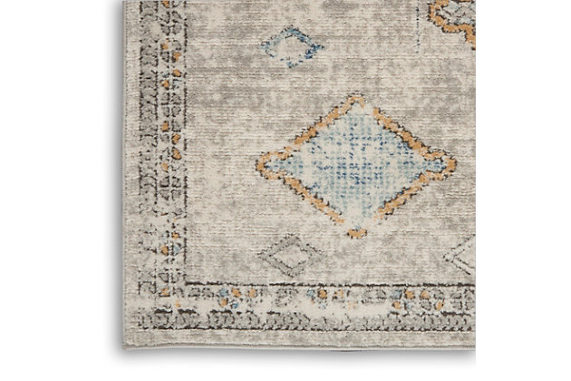 Decorate with diamonds! This unique, moroccan-inspired center medallion design from the quarry collection of area rugs presents a string of diamonds in a subtle mineral palette of ivory, blue, and gold. Power-loomed for texture and comfort with thick cut-pile in a soft, easy to clean blend of polyester and polypropylene. A vintage fade, ornamental border and serged edge complement boho, contemporary, and modern styles of decor.Easy-care fibers | Serged edges | Cut pile | Machine made | Power-loomed | Moderate shedding | Recommended for areas with moderate foot traffic | Indoor only | 80% polypropylene, 20% polyester | Imported