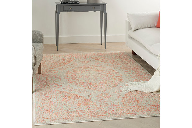 Invite elegance, beauty and harmony into your home with this delicately toned area rug from our tranquil collection. Its traditional persian floral center medallion and ornamental border is made modern through softly faded pink and ivory tones with an abrash finish. Power-loomed of highly durable, easy-clean polypropylene fibers.Easy-care fibers | Excellent value | Cut pile | Machine made | Power-loomed | Low shedding | Recommended for areas with moderate foot traffic | Indoor only | 100% polypropylene | Imported