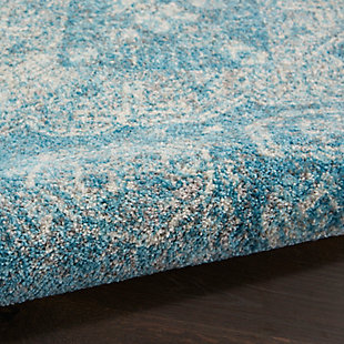 Enter a world of sublime harmony with the beauty of this tranquil collection area rug. Its transitional persian rug design is elegantly modulated with a vintage abrash finish for a soft, harmonious look in gently faded blue and ivory. The lush, power-loomed cut pile is easy to clean for the modern lifestyle.Easy-care fibers | Cut pile | Machine made | Power-loomed | Low shedding | Recommended for areas with moderate foot traffic | Indoor only | 100% polypropylene | Imported