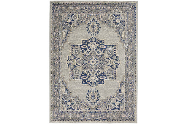 The drama of a classic persian center medallion design is softened by the transitional appearance of this tranquil collection area rug. Its gently distressed abrash finish creates vintage charm and enhances the warmth of its grey and navy palette. Ornamental border and textured cut pile complete the appeal of this easy-clean rug.Easy-care fibers | Cut pile | Machine made | Power-loomed | Low shedding | Recommended for areas with moderate foot traffic | Indoor only | 100% polypropylene | Imported