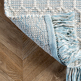 Made from the finest materials in the world and with the uttermost care, our rugs are a great addition to your home.Handmade | Imported | Material: 84% wool, 16% cotton | Bac: no bac | Setting: indoor | Recommended rooms: bedroom, living room | Includes fringe