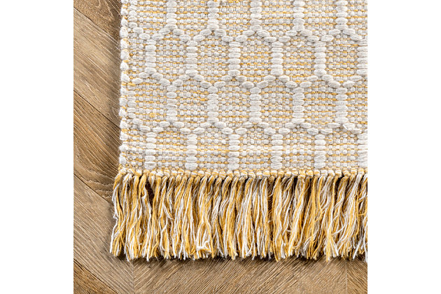 Made from the finest materials in the world and with the uttermost care, our rugs are a great addition to your home.Handmade | Imported | Material: 84% wool, 16% cotton | Backing: no backing | Setting: indoor | Recommended rooms: bedroom, living room | Includes fringe