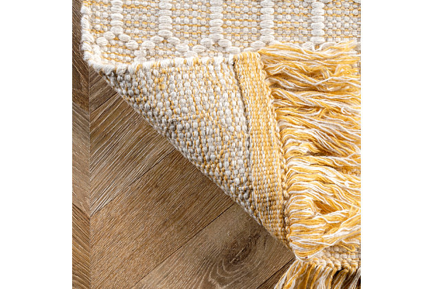 Made from the finest materials in the world and with the uttermost care, our rugs are a great addition to your home.Handmade | Imported | Material: 84% wool, 16% cotton | Backing: no backing | Setting: indoor | Recommended rooms: bedroom, living room | Includes fringe