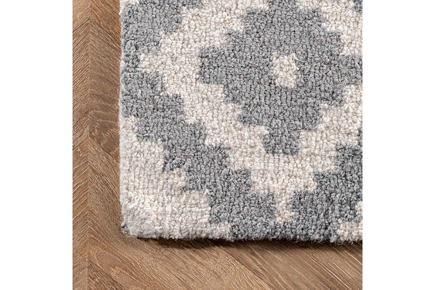 Made from the finest materials in the world and with the uttermost care, our rugs are a great addition to your home.Hand tufted | Imported | Material: 100% wool | Backing: non-slip latex | Setting: indoor | Recommended rooms: bedroom, living room