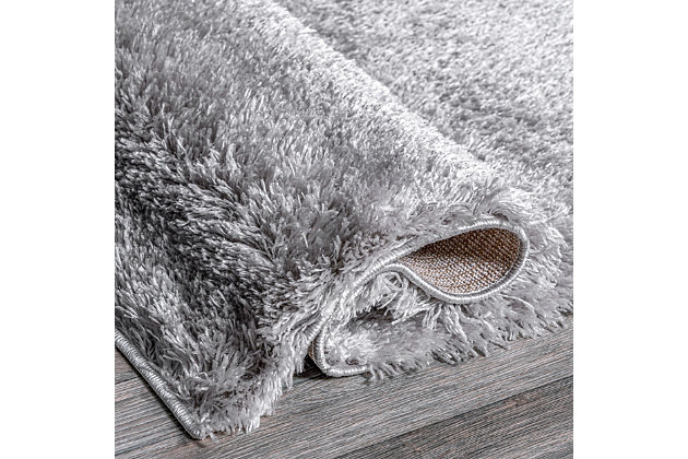 Made from the finest materials in the world and with the uttermost care, our rugs are a great addition to your home.Machine made | Imported | Material: 100% polyester | Backing: slip jute | Setting: indoor