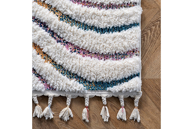 Made from the finest materials in the world and with the uttermost care, our rugs are a great addition to your home.Machine Made | Imported | Material: 100% Polypropylene | Backing: Slip Jute | Setting: Indoor | Recommended Rooms: Living Room, Bedroom, Nursery | Includes Braided Tassels