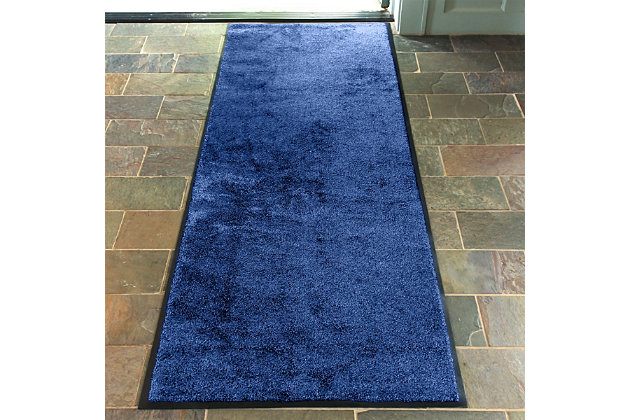 A thick, plush carpet pile that absorbs up to 50 percent more moisture and dirt than standard mats. Helps stop dirt at the door.Made with cotton and PET | Slip resistant with rubber non-slip backing | Won't fade  | Easy clean | Shake, vacuum or rinse | Made in the USA