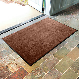 A thick, plush carpet pile that absorbs up to 50 percent more moisture and dirt than standard mats. Helps stop dirt at the door.Made with cotton and PET | Slip resistant with rubber non-slip backing | Won't fade  | Easy clean | Shake, vacuum or rinse | Made in the USA