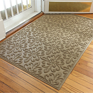 Weather resistant and a breeze to clean, this indoor-outdoor rug is high style made for low-maintenance living. What a welcome addition, anywhere and everywhere.Made of polyester | Indoor-outdoor use | Colors and designs won't fade over time | Rubber backing | NFSI Certified High Traction equals legit protection against slips and falls | Water Dam™ border keeps over a 1 gallon of water off your floors | Made in the USA | Easy to clean; simply vacuum or shake clean. For the really muddy days, feel free to rinse with a hose and air dry