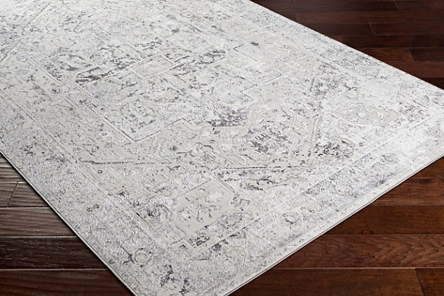 The Couture Accent Rug showcases a timeless style of elegance, comfort and sophistication. The meticulously woven construction of this piece boasts durability and will add natural charm to your decor. Made with polyester, this rug has a low pile. Made of polyester | Machine woven | 1-year limited warranty | Imported