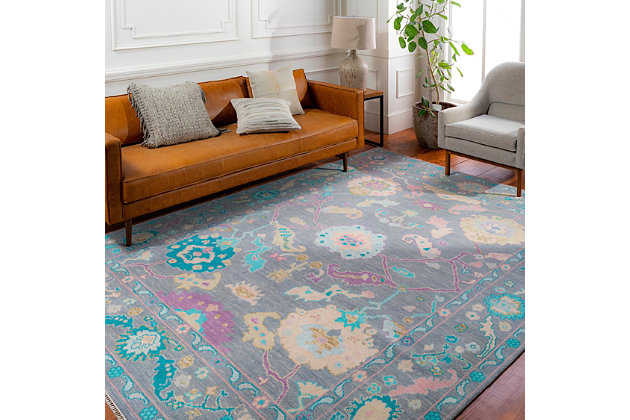 The Ushak Accent Rug showcases a timeless style of elegance, comfort and sophistication. This hand-knotted rug has a durability that can't be found in other handmade constructions. It can also be thoroughly cleaned, because it contains no chemicals that react to water (such as glue). Made with wool, this rug has a low pile. Made of wool | Hand-knotted | 1-year limited warranty | Imported