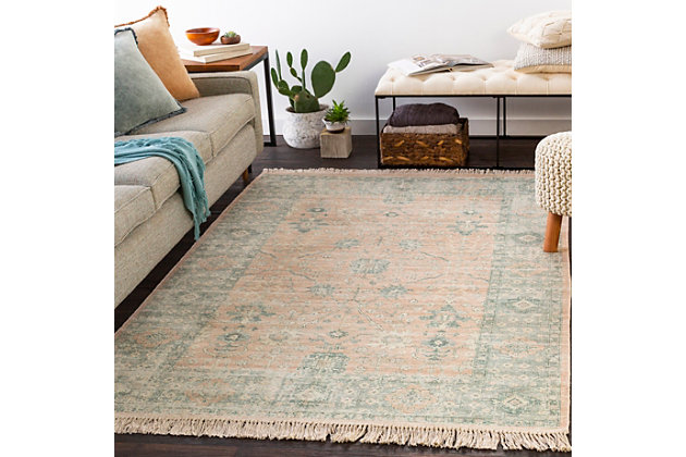 The Zainab Accent Rug showcases a timeless style of elegance, comfort and sophistication. The meticulously woven construction of this piece boasts durability and will add natural charm to your decor. Made with cotton and polyester, this rug has no pile. Made of cotton and polyester | Handwoven | 1-year limited warranty | Imported