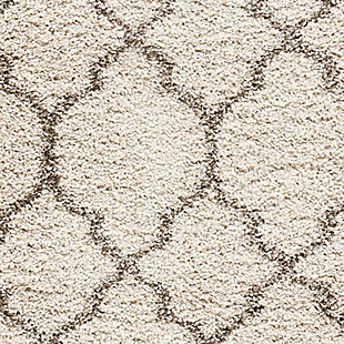 With its vintage pattern and rich hues, this marvelous rug exudes a retro vibe sure to add a shot of style to any space. Warm, inviting, and irresistably textured, it's the ultimate in cozy comfort.Serged edges, easy-care fibers | Shag pile | Machine made | Serged edges | Low shedding | Recommended for areas with moderate foot traffic | Rectangle | Indoor only