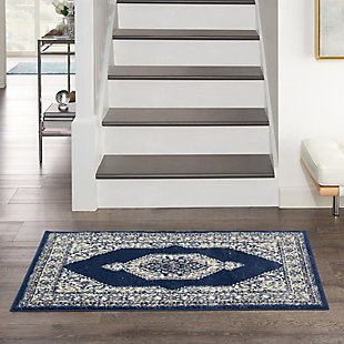 Decorate with classic assurance with the formal beauty of this area rug. It hits all the notes of traditional persian design, from the strong center medallion to the intricate floral surround and decorative border, while a contemporary sense of color and easy-care fibers lend the best of modern style.Made of polypropylene and polyester | Machine made | Thin pile (less than 0.5" high) | Power-loomed | Vacuum regularly (no beater bar) | Low shedding | Rug pad recommended | Recommended for areas with moderate foot traffic | Imported