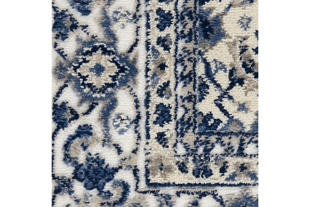 Decorate with classic assurance with the formal beauty of this area rug. It hits all the notes of traditional persian design, from the strong center medallion to the intricate floral surround and decorative border, while a contemporary sense of color and easy-care fibers lend the best of modern style.Made of polypropylene and polyester | Machine made | Thin pile (less than 0.5" high) | Power-loomed | Vacuum regularly (no beater bar) | Low shedding | Rug pad recommended | Recommended for areas with moderate foot traffic | Imported
