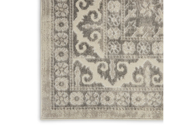 Add subtle distinction to any room with this elegant area rug. Inspired by persian rug traditions, the floral design with center medallions is refined for modern sensibility with soft and easy-care fibers.Made of polypropylene and polyester | Machine made | Thin pile (less than 0.5" high) | Power-loomed | Vacuum regularly (no beater bar) | Low shedding | Rug pad recommended | Recommended for areas with moderate foot traffic | Imported