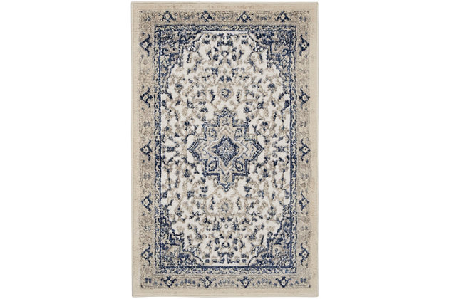 This subtly dramatic area rug is the perfect focal point for any space in need of sophisticated elegance. An elaborate center medallion layers floral and geometric motifs together for an endlessly fascinating design. Easy-care non-shed fibers promise modern convenience and delicious softness.Made of polypropylene and polyester | Machine made | Thin pile (less than 0.5" high) | Power-loomed | Vacuum regularly (no beater bar) | Low shedding | Rug pad recommended | Recommended for areas with moderate foot traffic | Imported