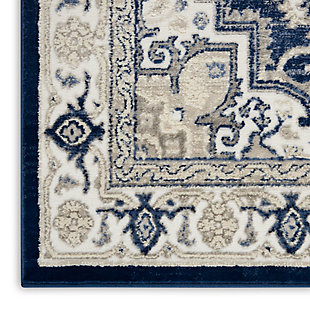 This subtly dramatic runner is the perfect focal point for any space in need of sophisticated elegance. An elaborate center medallion layers floral and geometric motifs together for an endlessly fascinating design. Easy-care non-shed fibers promise modern convenience and delicious softness.Made of polypropylene and polyester | Machine made | Thin pile (less than 0.5" high) | Power-loomed | Vacuum regularly (no beater bar) | Low shedding | Rug pad recommended | Recommended for areas with moderate foot traffic | Imported
