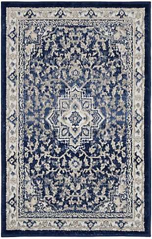 This subtly dramatic area rug is the perfect focal point for any space in need of sophisticated elegance. An elaborate center medallion layers floral and geometric motifs together for an endlessly fascinating design. Easy-care non-shed fibers promise modern convenience and delicious softness.Made of polypropylene and polyester | Machine made | Thin pile (less than 0.5" high) | Power-loomed | Pile shedding is a normal characteristic of quality area rugs; avoid pulling yarn knots out of surface pile. Use scissors to clip them off even with rug surface. Clean spills immediately by blotting with a clean sponge or cloth. Professionally clean only | Low shedding | Rug pad recommended | Recommended for areas with moderate foot traffic | Imported