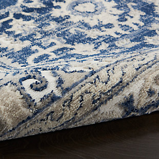 This subtly dramatic area rug is the perfect focal point for any space in need of sophisticated elegance. An elaborate center medallion layers floral and geometric motifs together for an endlessly fascinating design. Easy-care non-shed fibers promise modern convenience and delicious softness.Made of polypropylene and polyester | Machine made | Thin pile (less than 0.5" high) | Power-loomed | Pile shedding is a normal characteristic of quality area rugs; avoid pulling yarn knots out of surface pile. Use scissors to clip them off even with rug surface. Clean spills immediately by blotting with a clean sponge or cloth. Professionally clean only | Low shedding | Rug pad recommended | Recommended for areas with moderate foot traffic | Imported