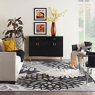 In shades of black, white and gray, this aloha indoor/outdoor rug brings extra life and excitement to your patio, deck, or poolside. Its high-low construction combines delightful texture with an intricately woven base for an exceptional look and feel that stands up to the elements. Machine made from premium stain-resistant fibers for long wear and easy cleaning (just rinse with a hose and air dry).Serged edges | Long wear and easy-clean fibers | Combination weave | Machine made from premium stain-resistant fibers | Power-loomed | Low shedding | Recommended for areas with heavy foot traffic | Indoor/outdoor | Adding a layer of padding helps cushion the rug and diminish pressure, helping to prolong the rug's life; also, the extra padding helps reduce sound in the room | Rug pad recommended | Vacuum regularly, clean spills immediately by blotting with a clean damp sponge or cloth; rinse with a hose if cleaning it outdoors; to extend the life of this area rug, bring it indoors during extreme weather | 100% polypropylene | Imported