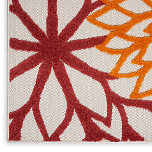 This tropical indoor/outdoor rug from the aloha collection features a soft cut pile and textural woven patterns in bursts of brilliant color sure to brighten the look of your surroundings. Oversized floral patterns in red, yellow, green, and orange add a festive touch of the tropics to your patio, deck, or porch. Machine made from premium stain-resistant fibers for ease of care (simply rinse with a hose and air dry).Serged edges | Easy-care fibers | Combination weave | Machine made from premium stain-resistant fibers | Power-loomed | Low shedding | Recommended for areas with heavy foot traffic | Indoor/outdoor | Adding a layer of padding helps cushion the rug and diminish pressure, helping to prolong the rug's life; also, the extra padding helps reduce sound in the room | Rug pad recommended | Vacuum regularly, clean spills immediately by blotting with a clean damp sponge or cloth; rinse with a hose if cleaning it outdoors; to extend the life of this area rug, bring it indoors during extreme weather | 100% polypropylene | Imported