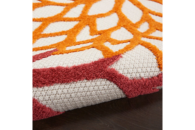 This tropical indoor/outdoor rug from the aloha collection features a soft cut pile and textural woven patterns in bursts of brilliant color sure to brighten the look of your surroundings. Oversized floral patterns in red, yellow, green, and orange add a festive touch of the tropics to your patio, deck, or porch. Machine made from premium stain-resistant fibers for ease of care (simply rinse with a hose and air dry).Serged edges | Easy-care fibers | Combination weave | Machine made from premium stain-resistant fibers | Power-loomed | Low shedding | Recommended for areas with heavy foot traffic | Indoor/outdoor | Adding a layer of padding helps cushion the rug and diminish pressure, helping to prolong the rug's life; also, the extra padding helps reduce sound in the room | Rug pad recommended | Vacuum regularly, clean spills immediately by blotting with a clean damp sponge or cloth; rinse with a hose if cleaning it outdoors; to extend the life of this area rug, bring it indoors during extreme weather | 100% polypropylene | Imported