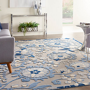 In swirling vines and flowers of blue, cream and gray, this aloha indoor/outdoor rug complements your patio, porch or poolside setting. A high-low weave combines textural patterns with an intricately woven base for exceptional look that stands up to the elements. Created from premium stain-resistant fibers for long wear, low maintenance, and a splendid texture.Serged edges | Long wear, low maintenance and splendid texture | Combination weave | Machine made from premium stain-resistant fibers | Power-loomed | Low shedding | Recommended for areas with heavy foot traffic | Indoor/outdoor | Adding a layer of padding helps cushion the rug and diminish pressure, helping to prolong the rug's life; also, the extra padding helps reduce sound in the room | Rug pad recommended | Vacuum regularly, clean spills immediately by blotting with a clean damp sponge or cloth; rinse with a hose if cleaning it outdoors; to extend the life of this area rug, bring it indoors during extreme weather | 100% polypropylene | Imported