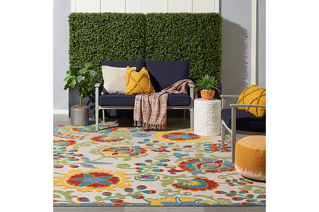 In swirling vines and flowers of green, red and yellow multicolor, this aloha indoor/outdoor rug complements your patio, porch or poolside setting. A high-low weave combines textural patterns with an intricately woven base for exceptional look that stands up to the elements. Created from premium stain-resistant fibers for long wear, low maintenance, and a splendid texture.Serged edges | Long wear, low maintenance and splendid texture | Combination weave | Machine made from premium stain-resistant fibers | Power-loomed | Low shedding | Recommended for areas with heavy foot traffic | Indoor/outdoor | Adding a layer of padding helps cushion the rug and diminish pressure, helping to prolong the rug's life; also, the extra padding helps reduce sound in the room | Rug pad recommended | Vacuum regularly, clean spills immediately by blotting with a clean damp sponge or cloth; rinse with a hose if cleaning it outdoors; to extend the life of this area rug, bring it indoors during extreme weather | 100% polypropylene | Imported