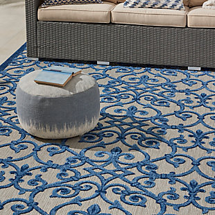 With its textural high-low style pile and scrolling floral design, this aloha indoor/outdoor rug invites a sophisticated feel to your home. Complementary tones of navy, light blue and beige make for an elegant centerpiece for your patio or deck. Created from premium stain-resistant fibers for easy cleaning and upkeep (just rinse with a hose and air dry).Hand carved | Premium stain-resistant fibers for easy cleaning | Flat weave | Machine made | Power-loomed | Low shedding | Recommended for areas with heavy foot traffic | Indoor/outdoor | Adding a layer of padding helps cushion the rug and diminish pressure, helping to prolong the rug's life; also, the extra padding helps reduce sound in the room | Rug pad recommended | Vacuum regularly, clean spills immediately by blotting with a clean damp sponge or cloth; rinse with a hose if cleaning it outdoors; to extend the life of this area rug, bring it indoors during extreme weather | 100% polypropylene | Imported
