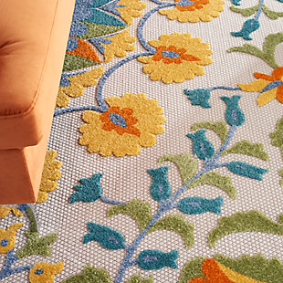 Beautifully bold and texturally rich, this floral indoor/outdoor area rug from the aloha collection lends a warm and sunny vibe to your porch or patio. Its high-low styled weave is crafted in vivid shades of blue, yellow, orange, and green on a classic white ground. Premium stain resistant fibers offer durability and ease of cleaning (simply rinse with a hose and let it air dry).Serged edges | Premium stain-resistant fibers for durability and easy cleaning | Combination weave | Machine made from easy-care fibers | Power-loomed | Low shedding | Recommended for areas with heavy foot traffic | Indoor/outdoor | Adding a layer of padding helps cushion the rug and diminish pressure, helping to prolong the rug's life; also, the extra padding helps reduce sound in the room | Rug pad recommended | Vacuum regularly, clean spills immediately by blotting with a clean damp sponge or cloth; rinse with a hose if cleaning it outdoors; to extend the life of this area rug, bring it indoors during extreme weather | 100% polypropylene | Imported